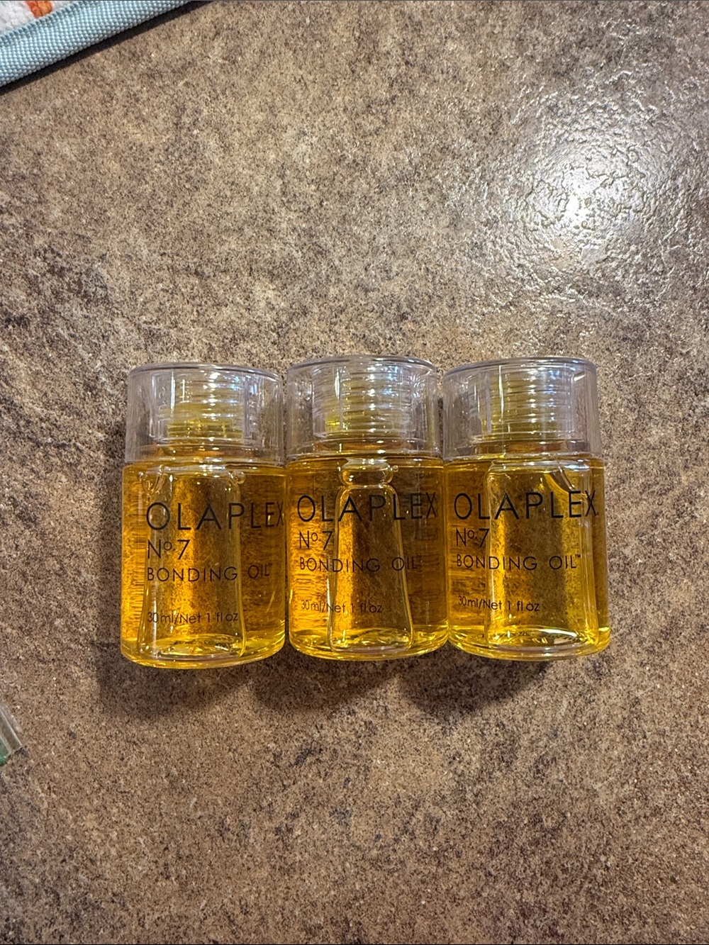 OLAPLEX No.7 Bonding Oil - Clear Bottle with Golden Yellow Oil